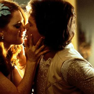 Still of Julianne Moore and Mark Wahlberg in Boogie Nights 1997