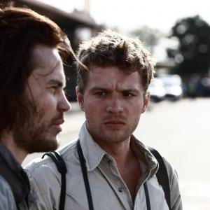 Still of Ryan Phillippe and Taylor Kitsch in The Bang Bang Club 2010