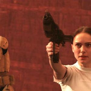 A clone trooper and Padm Amidala actress Natalie Portman take aim during the climactic end battle