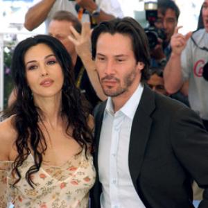 Keanu Reeves and Monica Bellucci at event of Matrica Perkrauta 2003