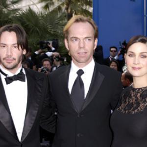 Keanu Reeves, Carrie-Anne Moss and Hugo Weaving at event of Matrica: Perkrauta (2003)