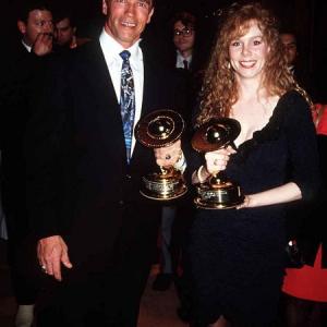 With ARNOLD SCHWARZENEGGER at Saturn Awards, Vivian accepting Best Picture for 