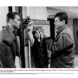 Still of Arnold Schwarzenegger and Austin OBrien in Last Action Hero 1993