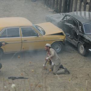 Still of Christian Slater and Scott Adkins in El Gringo (2012)