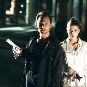 Still of Christian Slater and Tara Reid in Alone in the Dark 2005