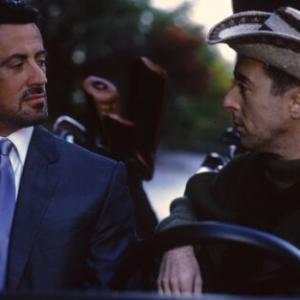 Stallone with co-star Alan Cumming