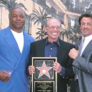Sylvester Stallone, Carl Weathers and Irwin Winkler