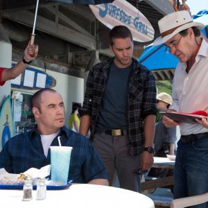 Oliver Stone, John Travolta and Taylor Kitsch in Laukiniai (2012)