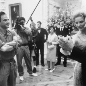 Still of Anthony Hopkins Oliver Stone and Joan Allen in Nixon 1995