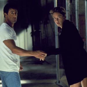 Still of Sylvester Stallone and Sharon Stone in The Specialist 1994
