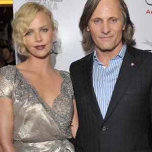 Charlize Theron and Viggo Mortensen at event of The Road 2009