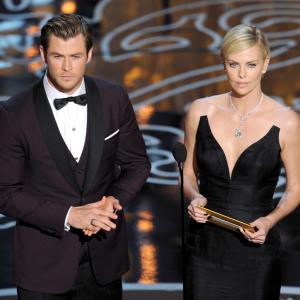 Charlize Theron and Chris Hemsworth at event of The Oscars (2014)