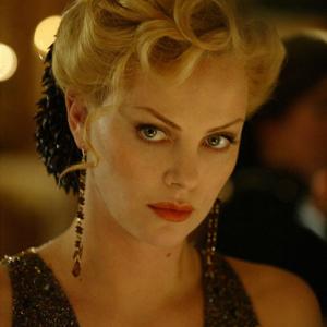Still of Charlize Theron in Head in the Clouds (2004)