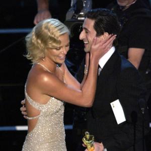 Charlize Theron and Adrien Brody