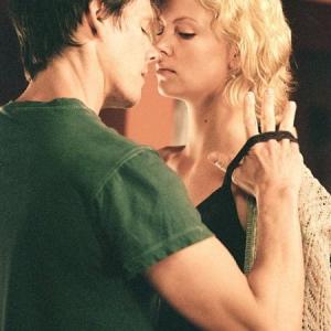 Still of Kevin Bacon and Charlize Theron in Trapped (2002)