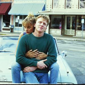 Still of Uma Thurman and Anthony Michael Hall in Johnny Be Good 1988