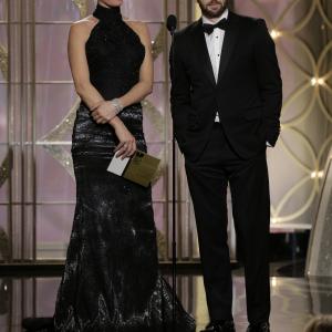 Uma Thurman and Chris Evans at event of 71st Golden Globe Awards (2014)