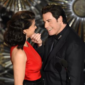 John Travolta and Idina Menzel at event of The Oscars (2015)