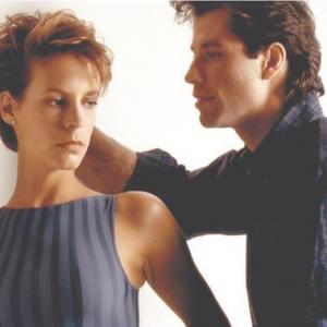 Still of Jamie Lee Curtis and John Travolta in Perfect 1985