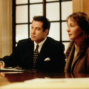 Still of John Travolta and Kathleen Quinlan in A Civil Action 1998
