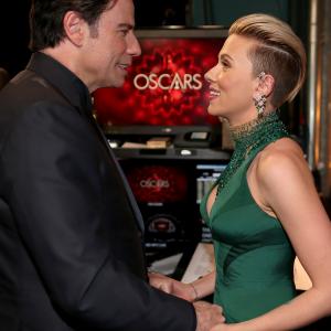 John Travolta and Scarlett Johansson at event of The Oscars (2015)