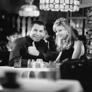 Still of John Travolta and Lisa Kudrow in Lucky Numbers (2000)