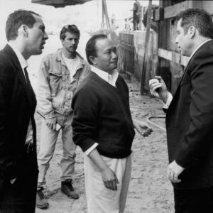 Still of Nicolas Cage, John Travolta and John Woo in Face/Off (1997)