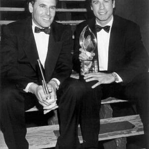 Krane with actor John Travolta backstage after accepting the Peoples Choice Award for best comedy for Look Whos Talking 1990