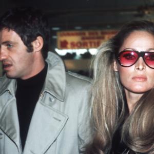 Actor JeanPaul Belmondo one of Frances biggest screen stars and a symbol of 1960s New Wave cinema and Swiss actress Ursula Andress upon their arrival at the Orly airport 29 November 1968