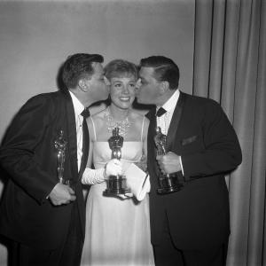 Best Actress Julie Andrews Mary Poppins with Best Song winners Richard M Sherman and Robert B Sherman Chim Chim Cheree from Mary Poppins at the 37th Academy Awards