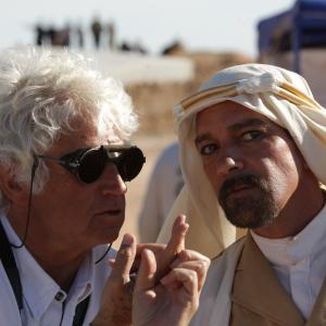 Black Gold director JeanJacques Annaud with Antonio Banderas on set in Tunisia