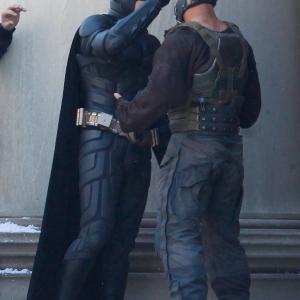 Christian Bale and Tom Hardy in between scenes during the filming of The Dark Knight Rises