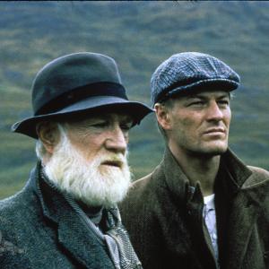 Still of Sean Bean and Richard Harris in The Field (1990)