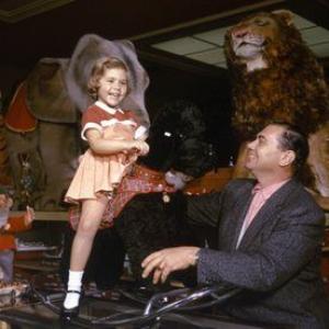 Ernest Borgnine and daughter Nancee at Uncle Bernies Toy Menagerie Beverly Hills CA 1957
