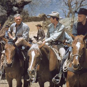 Still of James Coburn, Steve McQueen and Yul Brynner in The Magnificent Seven (1960)