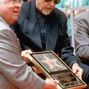 James Coburn receiving his star on the Hollywood Walk of Fame April 1 1994