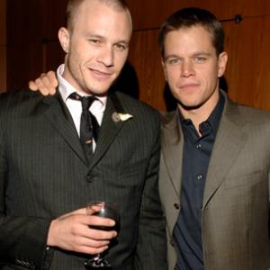 Matt Damon and Heath Ledger at event of The Brothers Grimm 2005