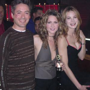 Ali Hillis (center), Robert Downey Jr. (right), and Michelle Mougnahan (left) from the wrap party for KISS, KISS, BANG, BANG