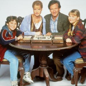 Robin Williams, Kirsten Dunst, Bonnie Hunt and Bradley Pierce in Jumanji (1995)