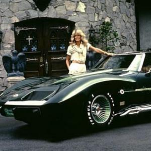 Farrah Fawcett at home with her Corvette C. 1976