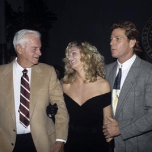 Farrah Fawcett her father James and Ryan ONeal at a screening for the television miniseries Poor Little Rich Girl The Barbara Hutton Story