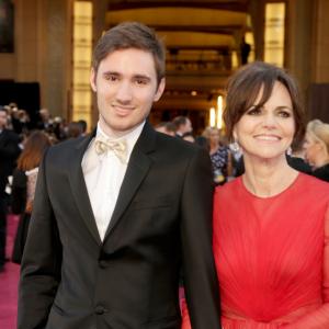 Sam Greisman L and Sally Field arrive at the Oscars at Hollywood  Highland Center on February 24 2013 in Hollywood California