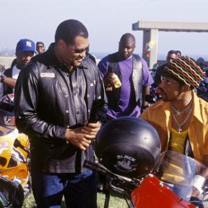 The leader of the Black Knights, Smoke (LAURENCE FISHBURNE, left) takes a moment between races with Soul Train (ORLANDO JONES) another member of his club.