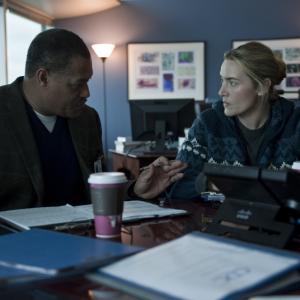 Still of Laurence Fishburne and Kate Winslet in Uzkratas 2011