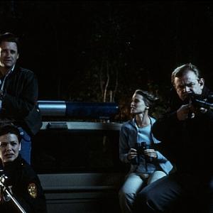 Still of Bridget Fonda, Bill Pullman, Meredith Salenger and Brendan Gleeson in Lake Placid (1999)