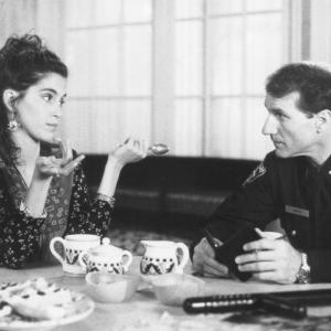 Still of Jami Gertz and Ed O'Neill in Sibling Rivalry (1990)