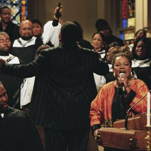 (Left) Wendell Pierce as Reverend Lewis (center with back toward camera) Cuba Gooding, Jr. as Darrin Hill and (right) Reverend Shirley Caesar as herself.