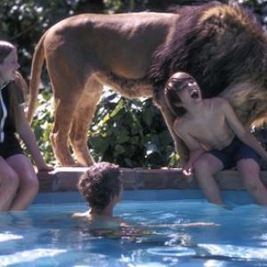 Melanie Griffith at home with her pet lion