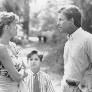 Still of Melanie Griffith Don Johnson and Elijah Wood in Paradise 1991
