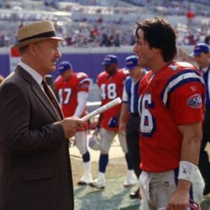 Gene Hackman as Coach McGinty and Keanu Reeves as Shane Falso
